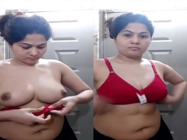 Beautiful housewife trying new bra on cam